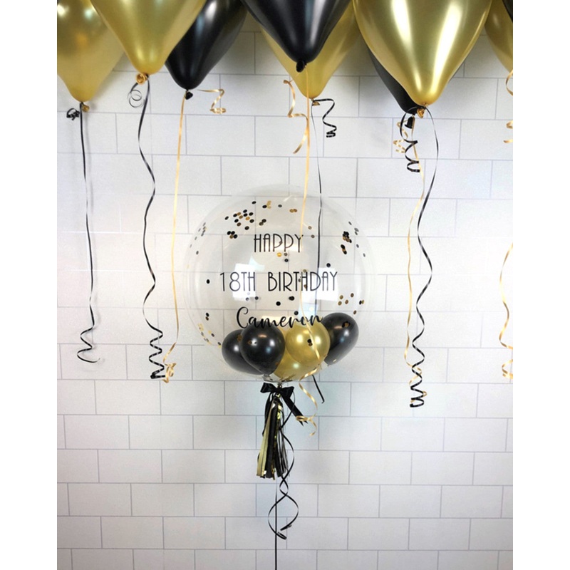 COLLECTION ONLY - Clear Bubble Balloon filled with Gold & Black Balloons, Black & Gold Confetti finished with a Black Personalised Message & Dressed with a Tassel & Bow + 10 Black & Gold Ceiling Balloons
